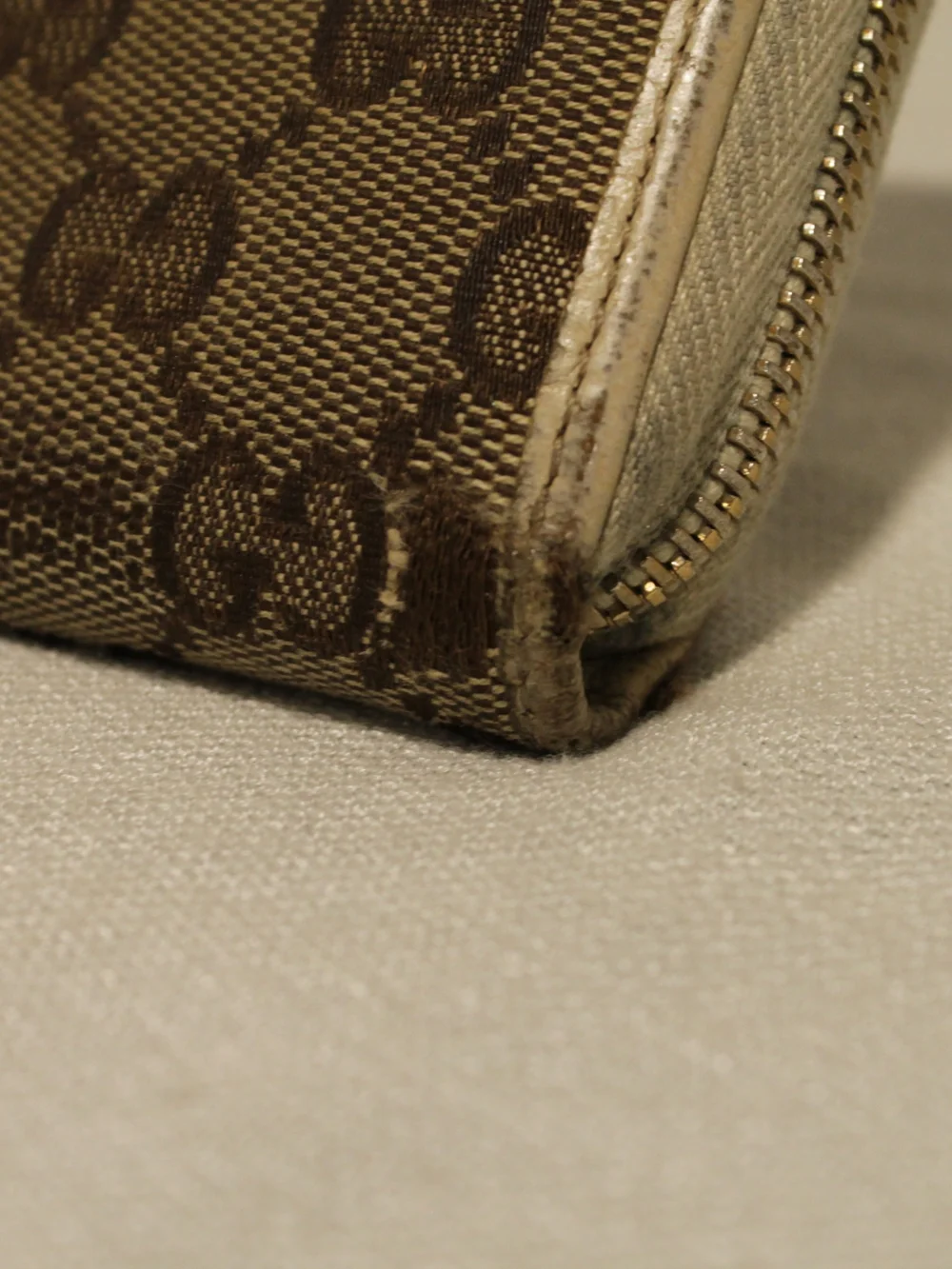 Gucci Brown Signature Canvas Zip Wallet